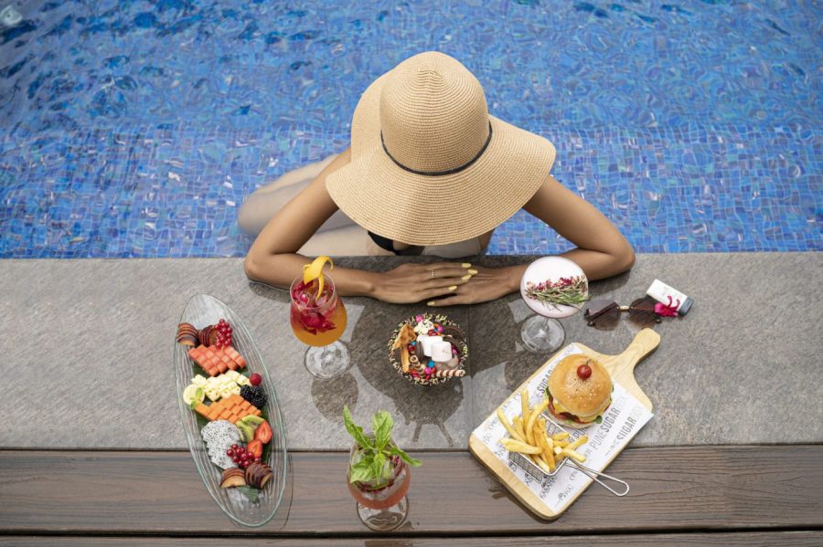Relaxing poolside experience at Conrad Pune Luxury by Hilton